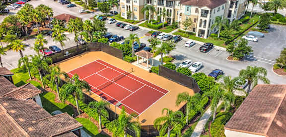 Aerial View of a Tennis Court at Hacienda Club Apartments in Jacksonville, FL