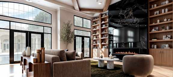 A modern living room with a fireplace and a large window.