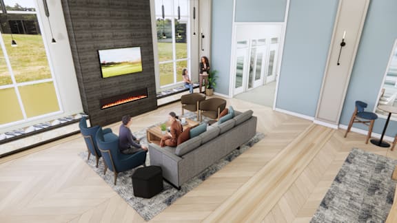 A living room with a fireplace and people sitting on the couch.