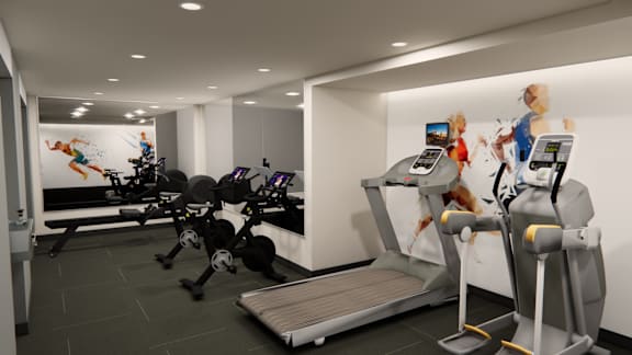 A gym with treadmills and exercise bikes.