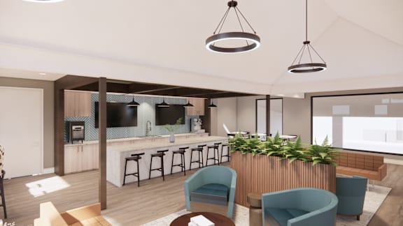 A modern kitchen with a bar area and seating.