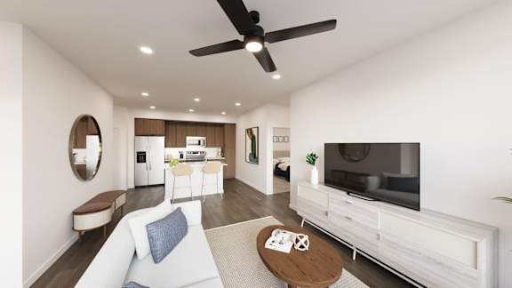 A modern living room with a white sofa and a wooden coffee table. at The Maverick Luxury Apartments, Monument, CO