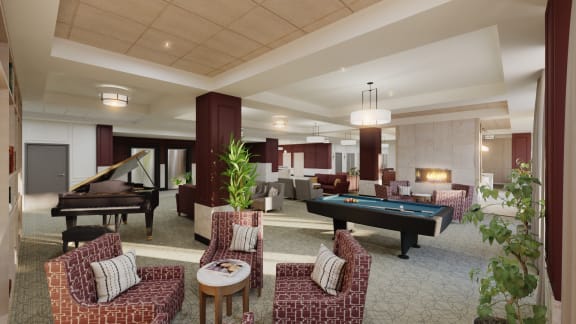 a lounge area with a pool table and a piano
