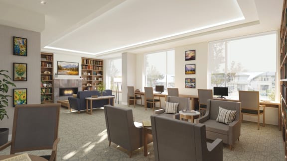 A reading room filled with natural light and chairs.