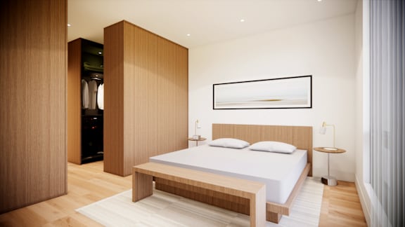 A modern bedroom with a large bed and a wooden cabinet.