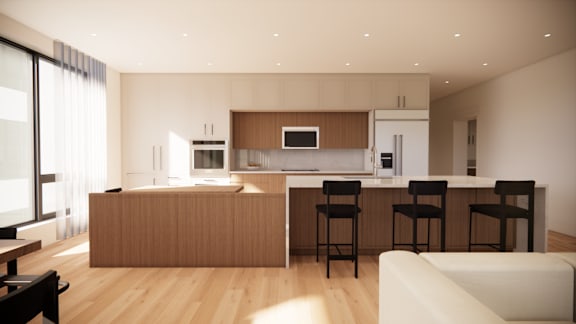 A modern kitchen with a bar stool and a white sofa.