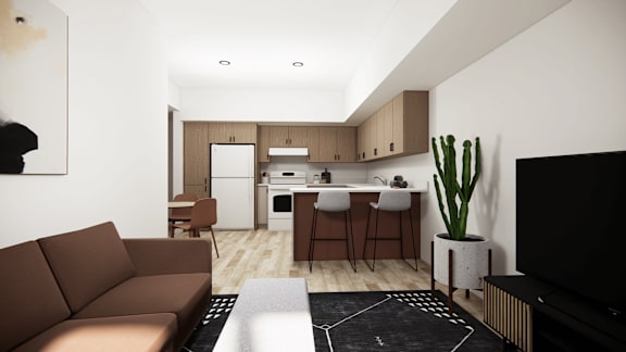A modern living room with a brown sofa and a black television.