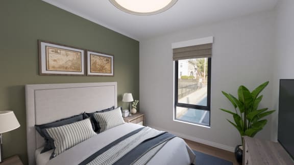 a bedroom with a bed and a window