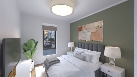 a bedroom with a large bed and a large window