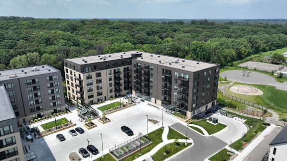 an aerial view of a development of new apartment buildings