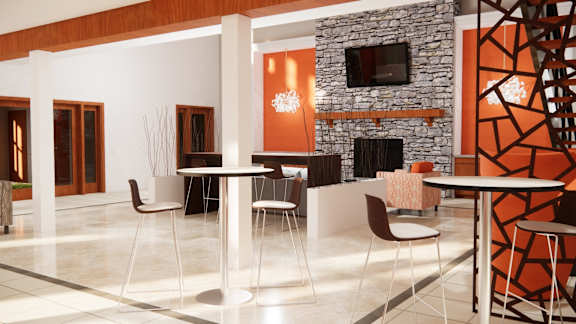 A modern dining area with a stone fireplace and a TV above it.
