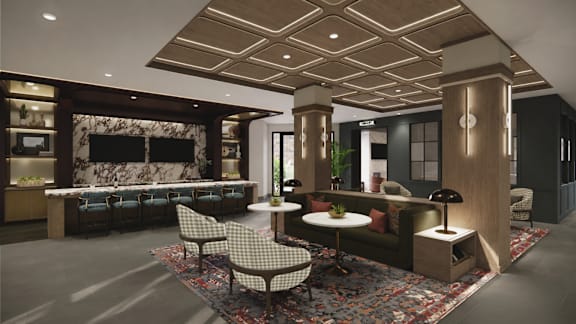 A modern living room with a sofa, chairs, and a coffee table.