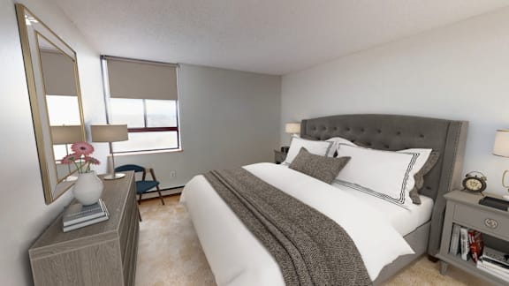 A bedroom with a large bed, a nightstand, and a dresser.
