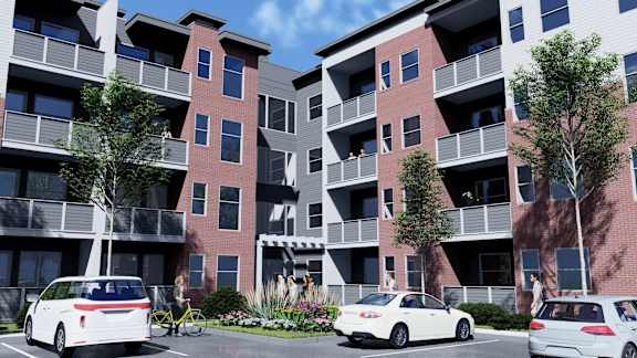 a rendering of an apartment building on a city street