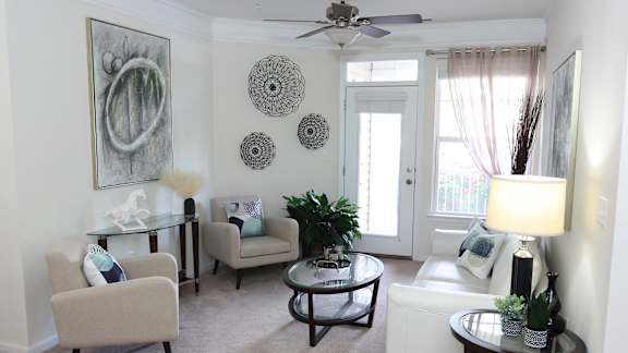 A view of the living room in the 1200 Acqua Model Apartment Home