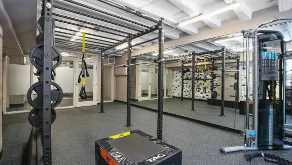 a view of the weights area in the gym