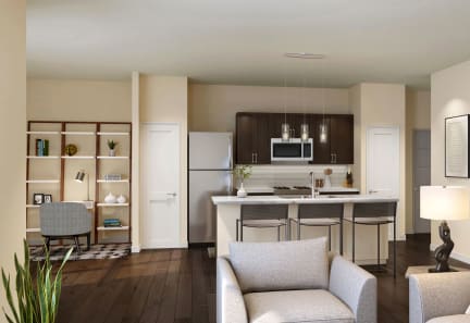 a kitchen and living room in a 555 waverly unit