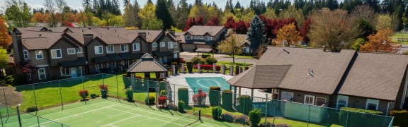 tennis court at the preserve at polo ridge apartments
