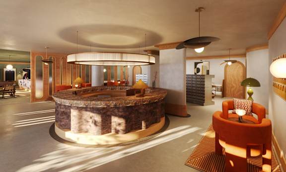 A modern living room with a circular stone island in the center.