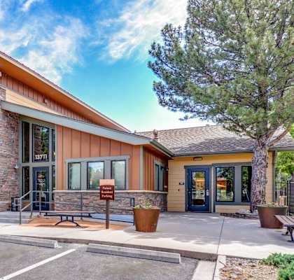 Copper Flats Leasing Office building with slanted roof and large windows