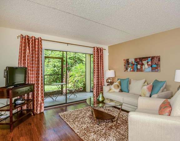 Bright Living Room at Bay Club Apartments in Bradenton, FL