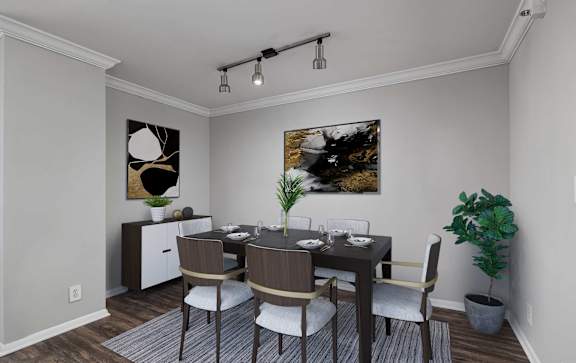 A dining room with a table set for four.