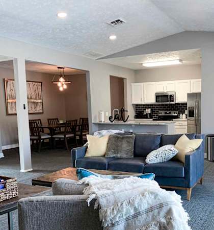 apartment clubhouse with a couch and a table