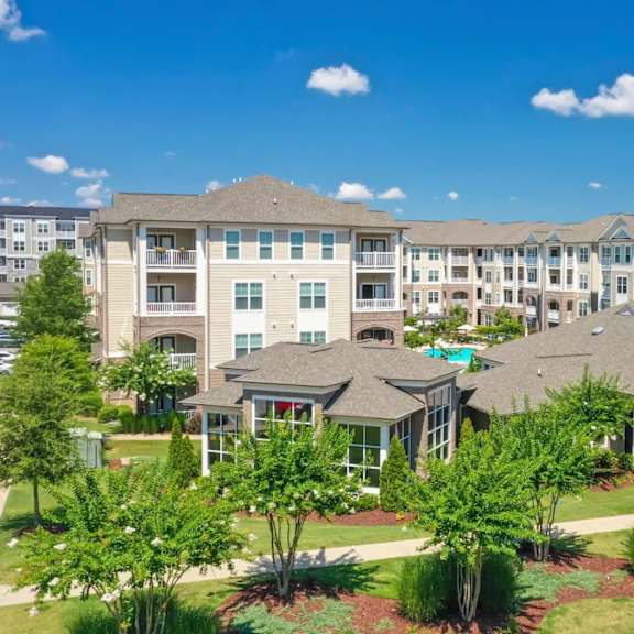 A large apartment complex with multiple buildings and landscaped gardens.
