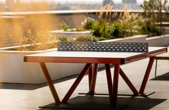 a table with an flag on it on a patio