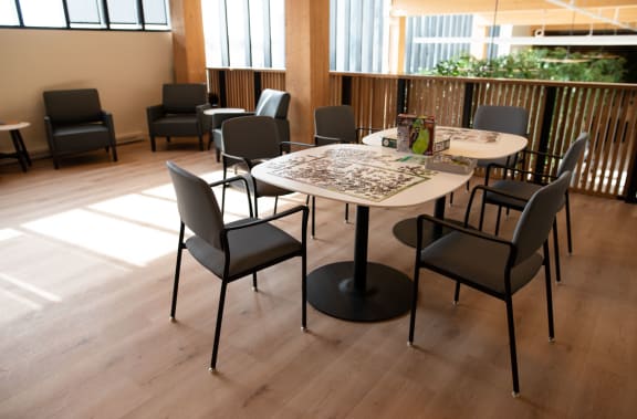 puzzles on a table in a community room