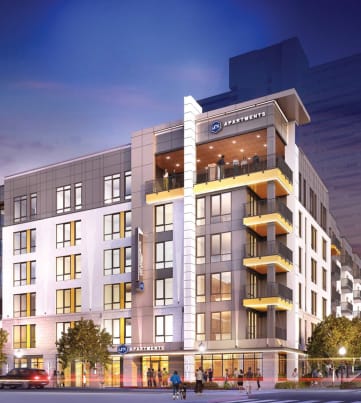 Brand new apartment building at dusk in Winston Salem's arts district