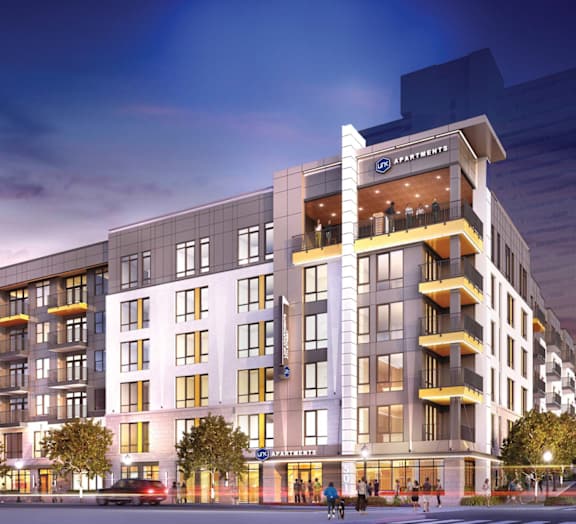 Brand new apartment building at dusk in Winston Salem's arts district