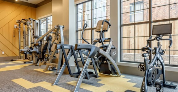 a room filled with lots of different types of exercise equipment at Alton Jefferson Park, Colorado