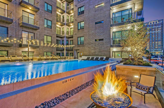 The Hudson Exterior and Pool with Firepit