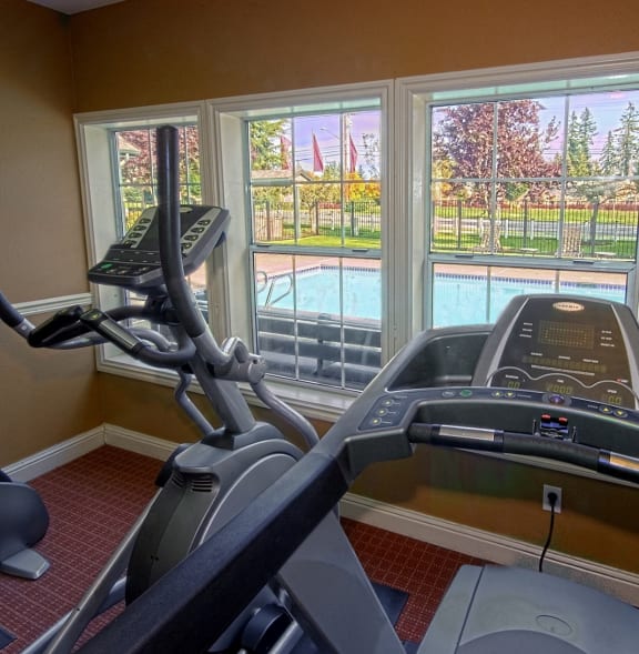 The Marina at Martha Lake Apartments in Bothell, Washington Fitness Center with View of Pool