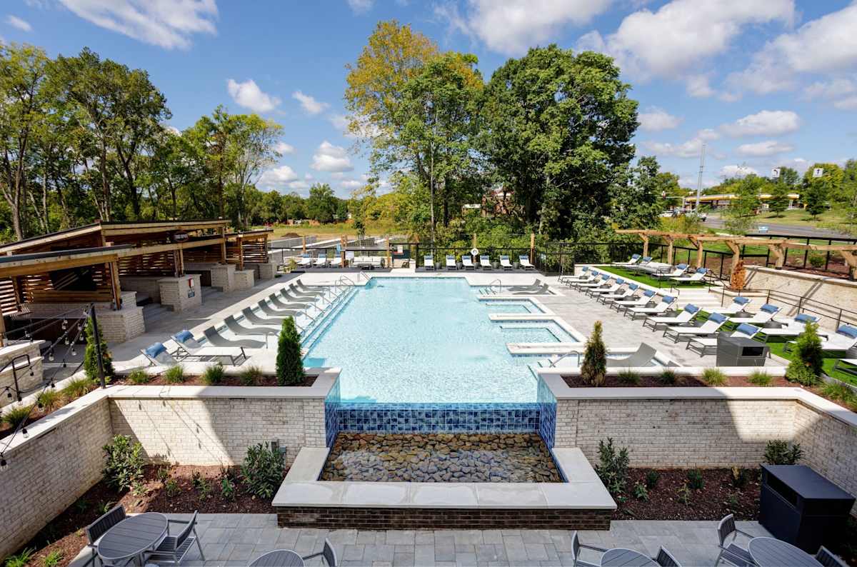 Vintage Franklin Apartments pool deck and lounge chairs - Franklin, TN
