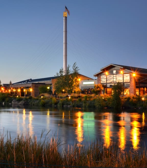 View of Buildings Along River at Night