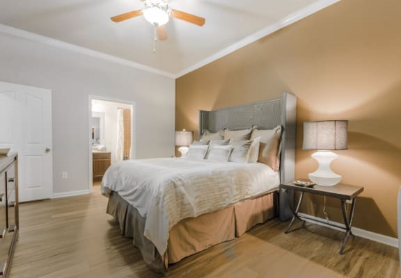 Bedroom with Hardwood Floors at the Retreat at Magnolia in Magnolia, TX 77354