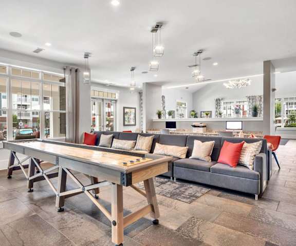 a games room with a ping pong table