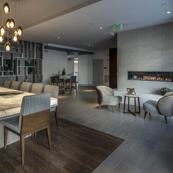 a rendering of a dining room with a table and chairs