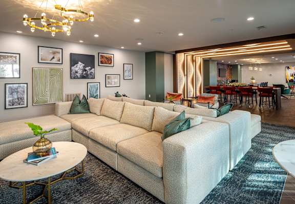 a living room with couches and a table