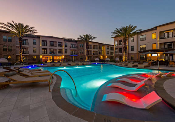 Berkshire Exchange resort-style pool at night in Spring, TX