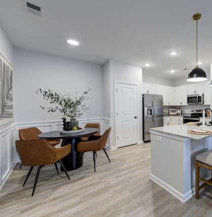 The Carolinian Apartments in Wilson, NC Model Kitchen and Dining Area