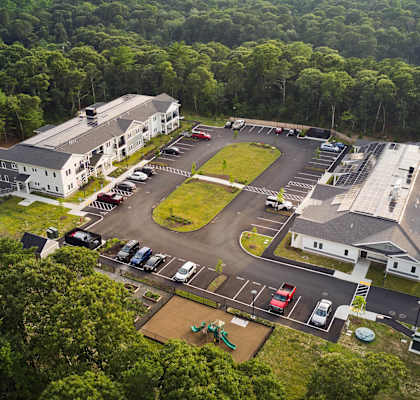 arial view of a building and parking lot