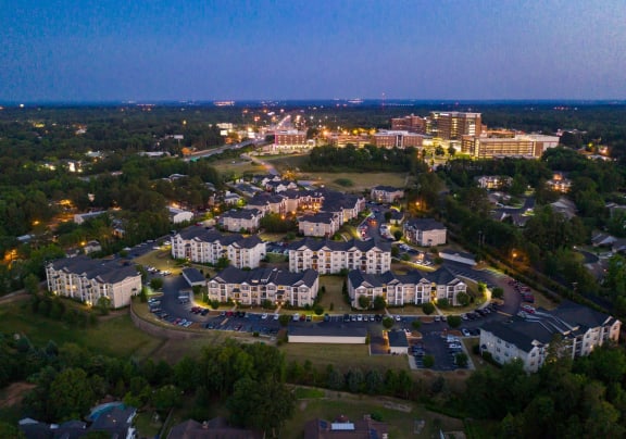 Drone Aerial View of Community at Night at Abberly Village Apartment Homes, West Columbia, SC