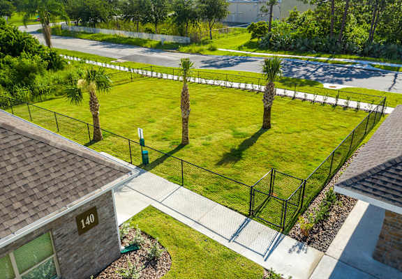 A house numbered 140 is seen from an aerial perspective. at Mode at Melbourne, LLC Apartments, Melbourne, FL, 32901