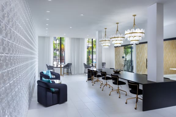 a room filled with furniture and a large window