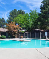 Arborpointe Apartments Pool with Lounge Chairs