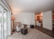 Thumbnail 6 of 32 - Farr Court Apartments Living Room and Balcony Door