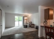 Thumbnail 5 of 32 - Farr Court Apartments Living Room and Counter